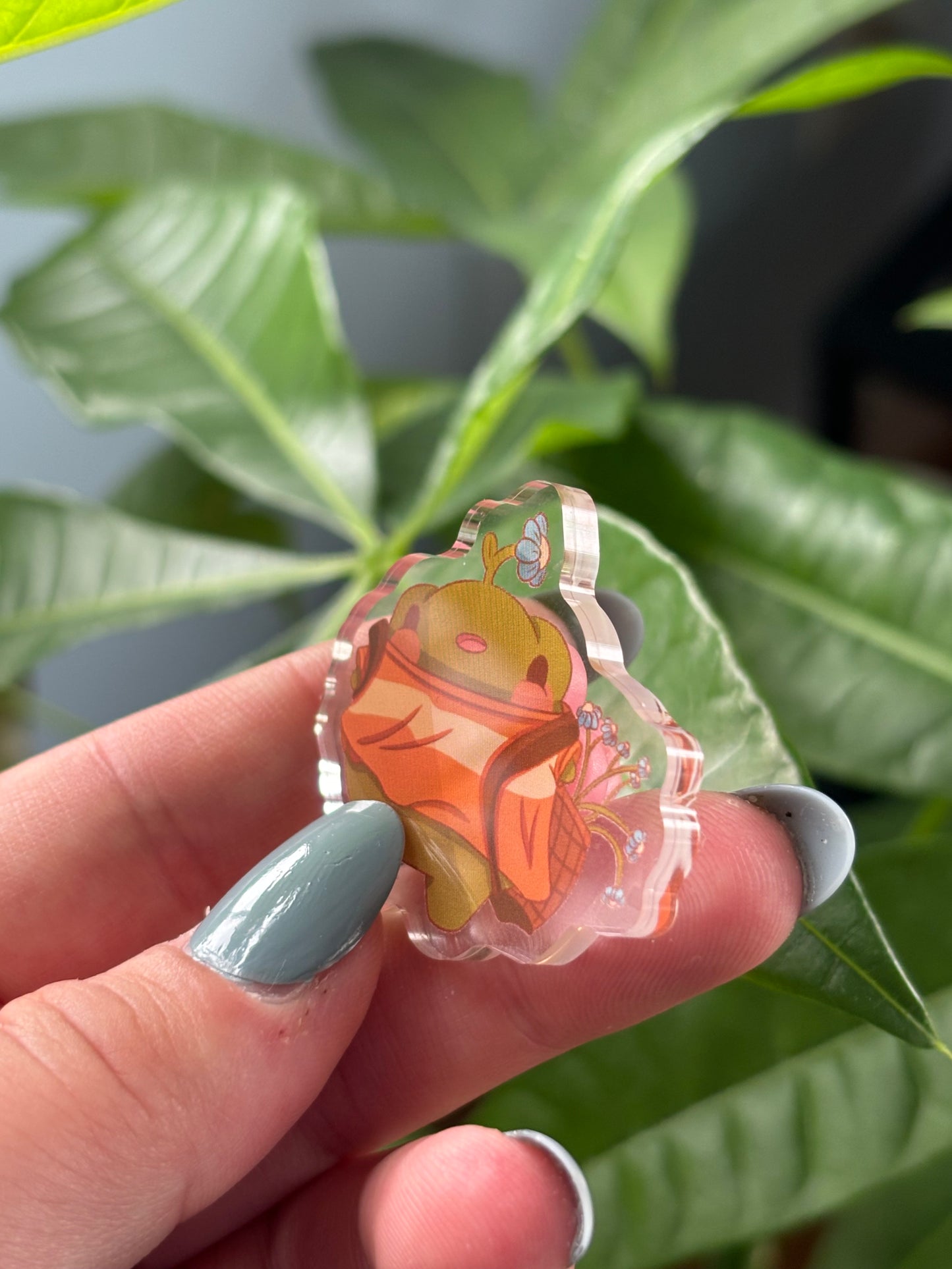 Gerald gathering flowers acrylic Pin
