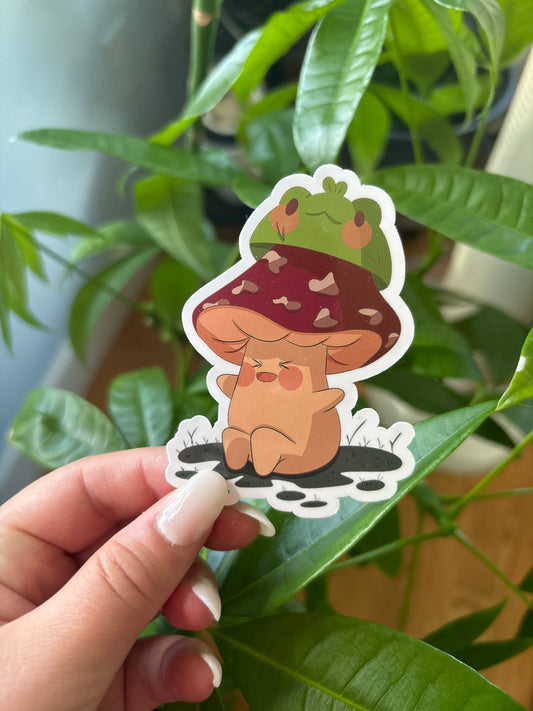 Moose wearing a frog hat