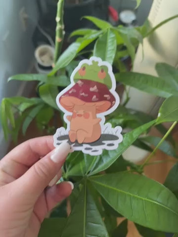 Moose wearing a frog hat